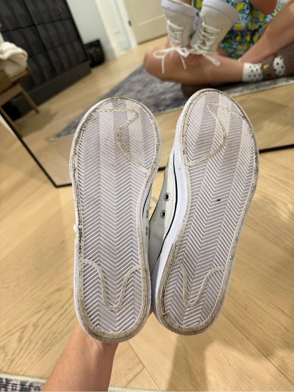 Nike Women’s White Canvas Sneakers with Black Swoosh